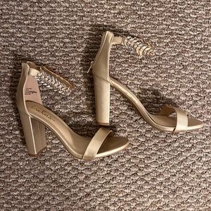Rarely worn Lulus gold ankle strapped heels.